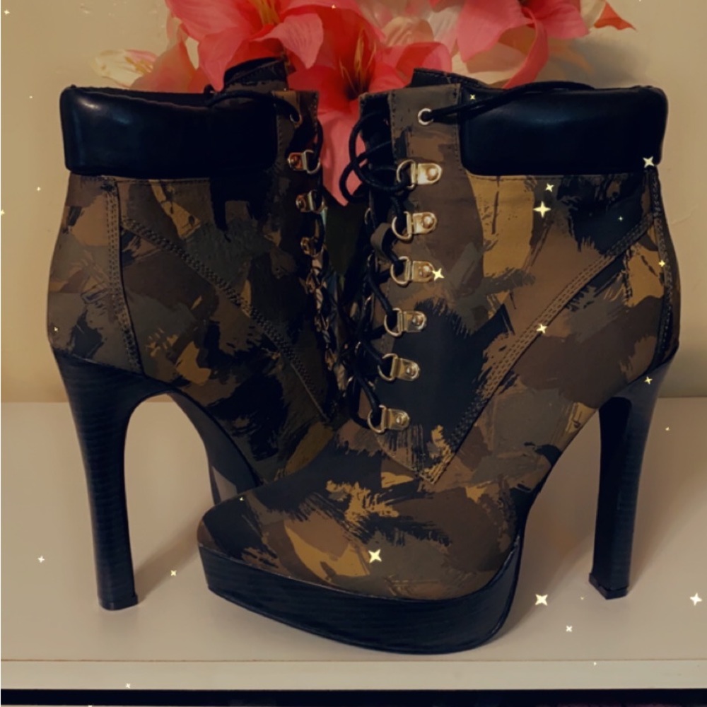 Camo high heeled boots.